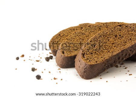 Slices of rye bread on a white background