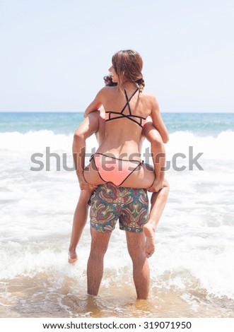 happy couple in a beach