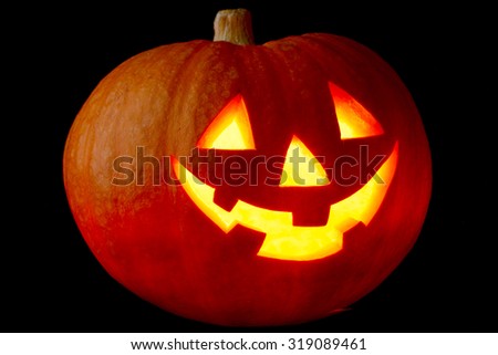 Funny Halloween Jack O' Lantern pumpkin on black background
