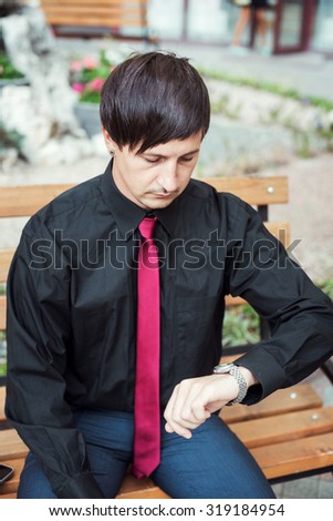 businessman looking at watches
