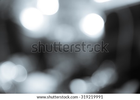 Abstract blur bokeh defocused of light in city  gray selenium  tone background