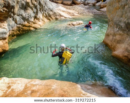 Canyoning in Barranco Oscuros, Sierra de Guara, Aragon, Spain Royalty-Free Stock Photo #319272215