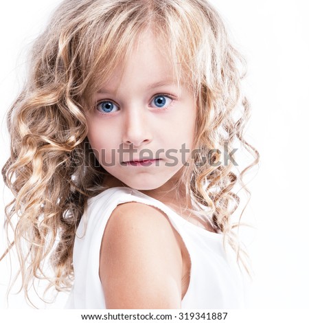 Portrait of a very beautiful little blonde girl.