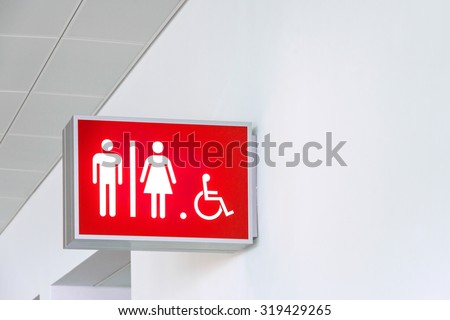 Blank- Restroom male- female and people living with disabilities public sing hanging on a wall