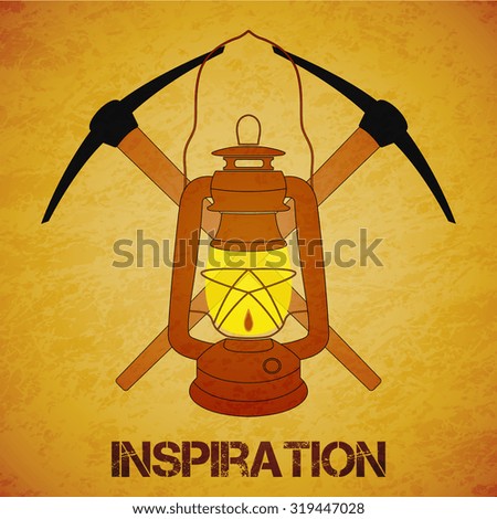 Vintage mine kerosene lantern with picks over yellow grunge background. Element for your design, posters and other industrial projects.