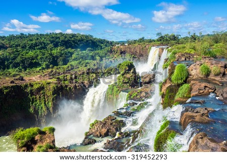 Iguazu Falls, on the border of Argentina, Brazil, and Paraguay. Royalty-Free Stock Photo #319452293
