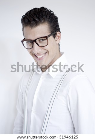 Young stylish man wears glasses and white shirt