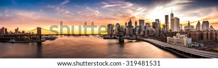 Brooklyn Bridge panorama at sunset Royalty-Free Stock Photo #319481531