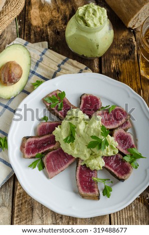 Beef steak with avocado dip and herbs, very simple very healthy recepy, rustic picture