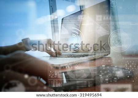 businessman hand working with modern technology and digital layer effect as business strategy concept Royalty-Free Stock Photo #319495694