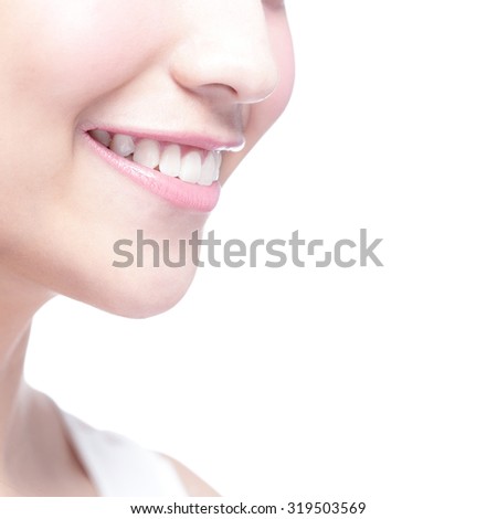 Beautiful young woman health teeth close up and charming smile. Isolated over white background, asian beauty