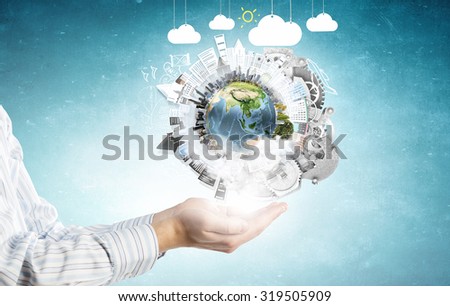 Close up of human hands holding Earth planet. Elements of this image are furnished by NASA