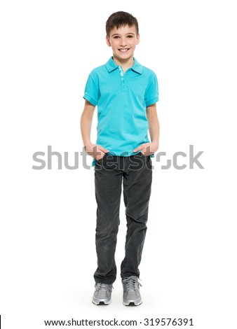 Young pretty boy posing at studio as a fashion model. Photo of preschooler 8 years old over white background Royalty-Free Stock Photo #319576391