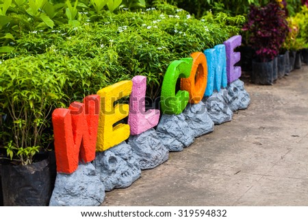 Welcome sign  with each letter