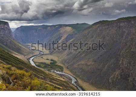 Beautiful mountain landscape with river in the gorge.