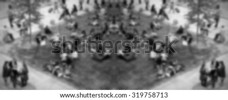 People crowd symmetric background, intentionally blurred post production.