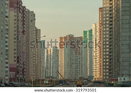 modern district. cityscape. panel high-rise buildings. night on the town