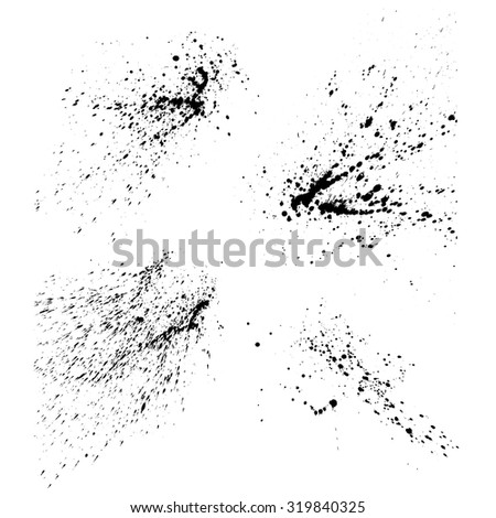 Set of black ink spray splatters on white background
