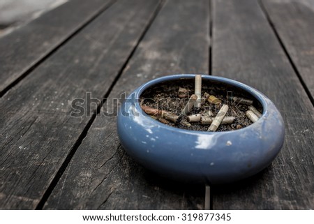 ashtray on wood table