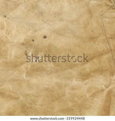 Old Faded Military Army Camouflage Backpack Or Bag Or Uniform Square Frame Background Texture Close-up Top View