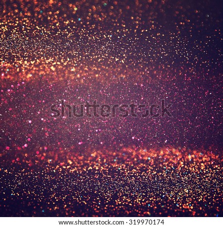 abstract blurred photo of bokeh light burst and textures. multicolored light.
