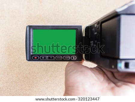 green screen of mini camcorder or video recording for frame picture background in vintage feeling and instagram look