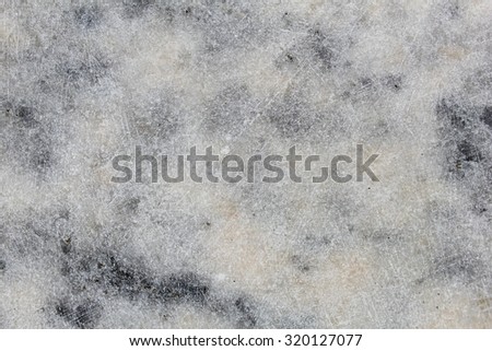 Background marble texture with black and yellow spots 