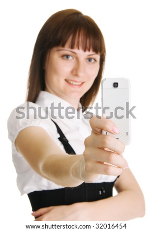 Young woman photographing with a mobile phone