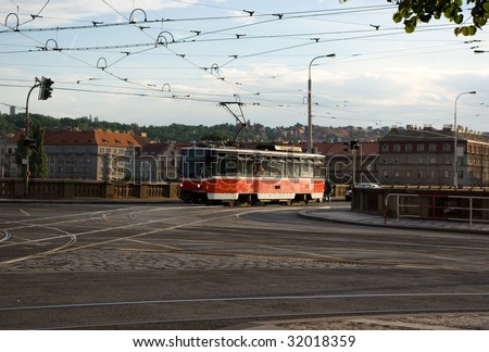 Tram on the bridge in downtown of Prague, Czech Republic