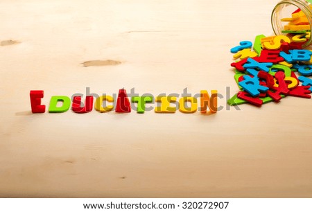 education text on wood background