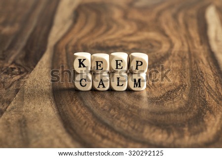 KEEP CALM word background on wood blocks