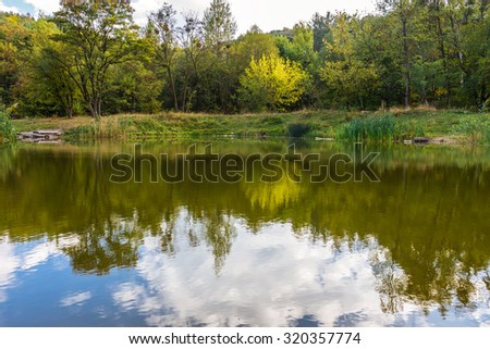 Amazing colorful landscape with lake and park, early fall, Lviv, Ukraine