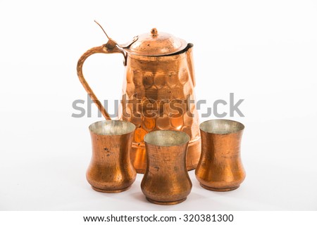 Copper jug and copper wine cups