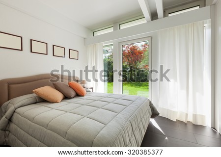 Architecture, comfortable bedroom of a modern house