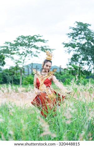 woman wearing typical thai dress with thai style