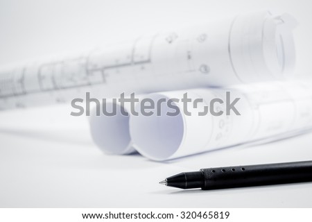 Architectural project,Architecture  plans,Architecture  plans on desk. Royalty-Free Stock Photo #320465819