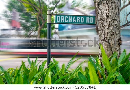 A Street View Of The Orchard Road In Singapore With The Motion Blur. The Orchard Road Longs 2.2 Kilometers And One Of The Major Tourist Attractions And Entertainment Hub Of Singapore