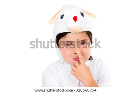 Cute young boy dressed in bunny costume making adorable faces isolated over white background.