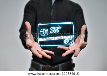 Men's hand holding an credit card icon in the hand