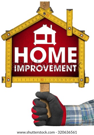 Home Improvement Sign with Meter Tool / Hand with work glove holding a sign with a meter ruler in the shape of house with text Home Improvement. Isolated on white background