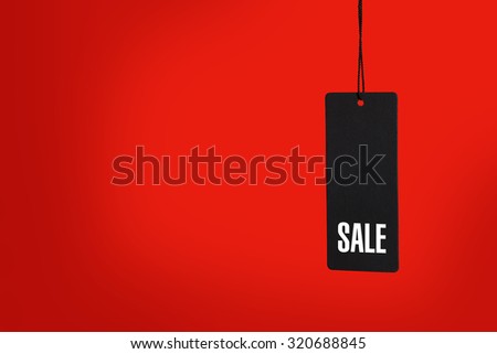 Sale tag on the red background