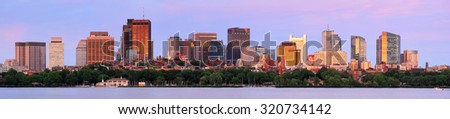 Boston Charles River sunset panorama with urban skyline and skyscrapers 