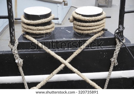 Ropes on bord of a traditional ship in the harbor of Hamburg, Germany