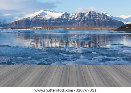 Opening wooden floor, Jokulsarlon lagoon, Beautiful cold landscape picture of icelandic glacier lagoon bay, Iceland