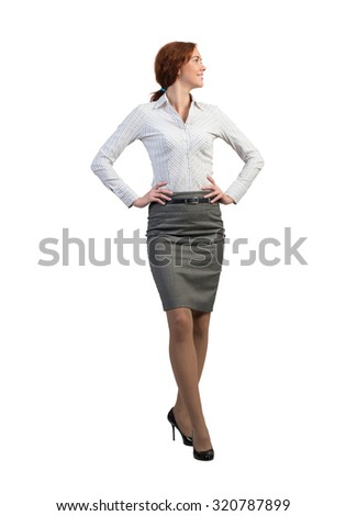 Full lenght image of young confident businesswoman on white background