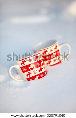 mug with a picture of moose lying in the snow