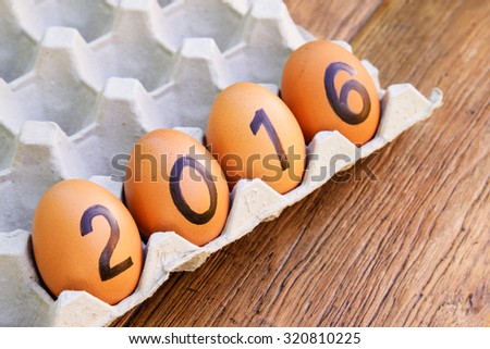 2016 word from eggs in paper tray