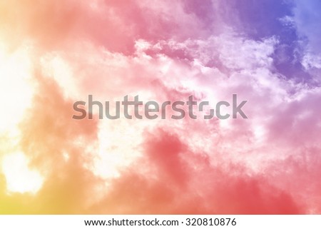 sun and cloud background with a pastel colored gradient.