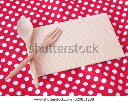 wooden note with cute  spoon and fork