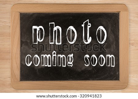 photo coming soon -  chalkboard with outlined text - on wood